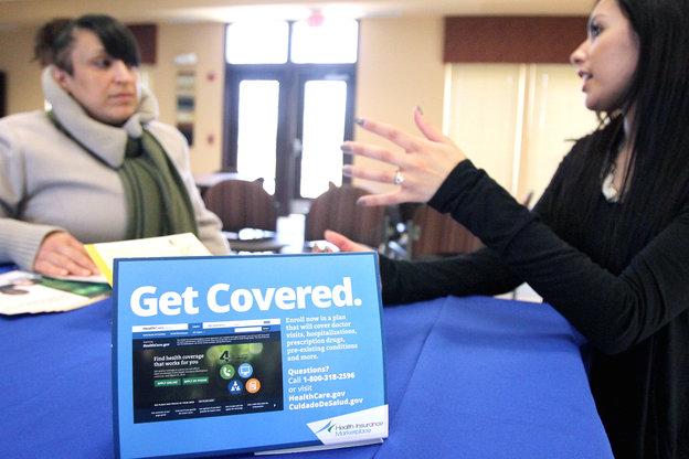 In New Jersey in March, Dianna Lopez of the Center for Family Services (right) speaks with Betsy Cruz, of Camden, N.J., about health insurance coverage during an Affordable Care Act information session. In New Jersey in March, Dianna Lopez of the Center for Family Services (right) speaks with Betsy Cruz, of Camden, N.J., about health insurance coverage during an Affordable Care Act information session.